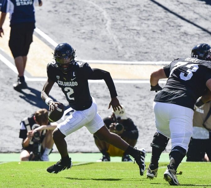 September 09, 2023: Colorado Buffaloes quarterback Shedeur Sanders (2) rolls out to avoid the rush before making a long completion in the football game between Colorado and Nebraska in Boulder, CO. Derek Regensburger/CSM. (Credit Image: © Derek Regensburger/Cal Sport Media) (Cal Sport Media via AP Images)