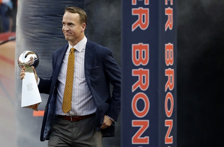 Peyton Manning and Vince Lombardi Trophy